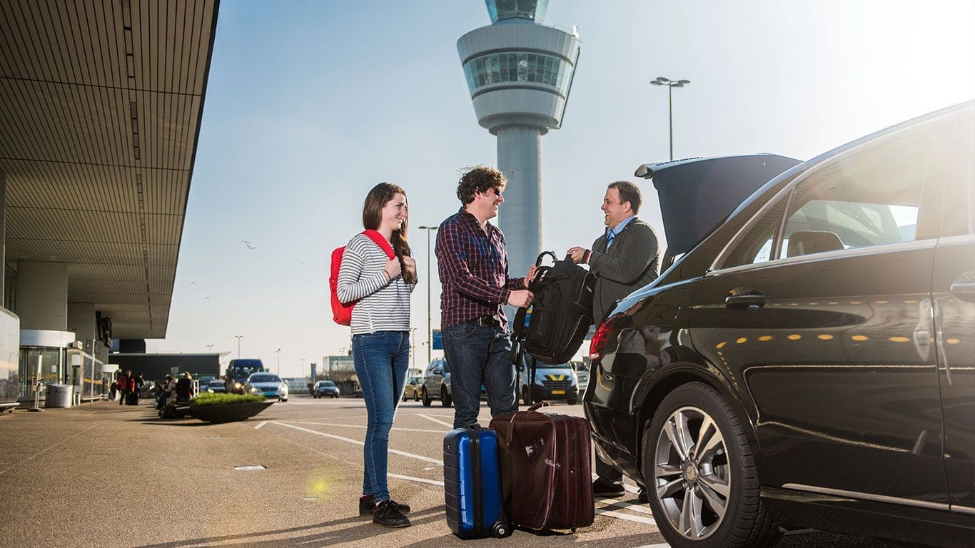 A couple experiencing a a stress-free airport transfer